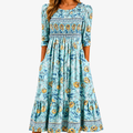 Golden Bloom Smocked Garden Midi Klänning